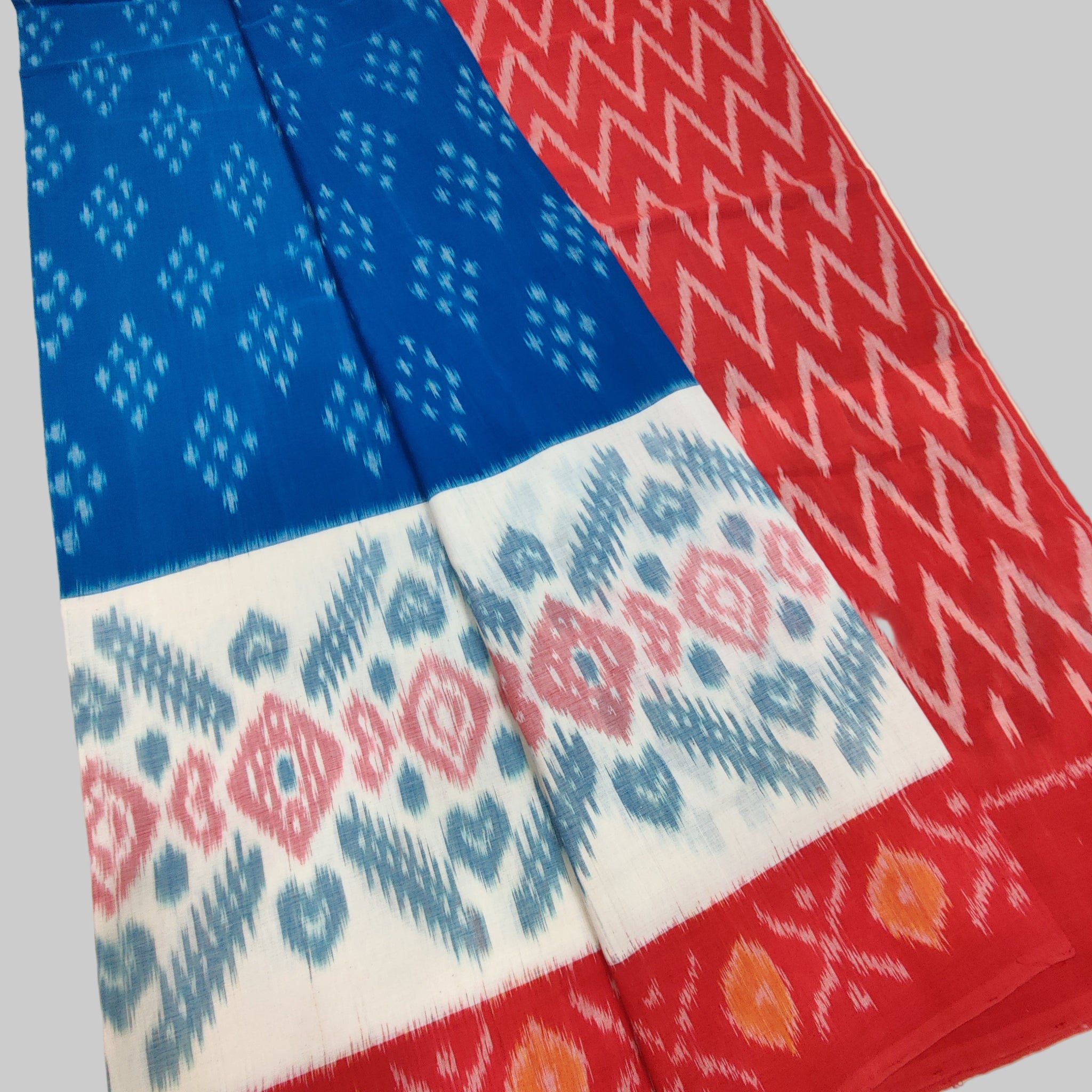 Set of colorful patterned cloths on a white surface