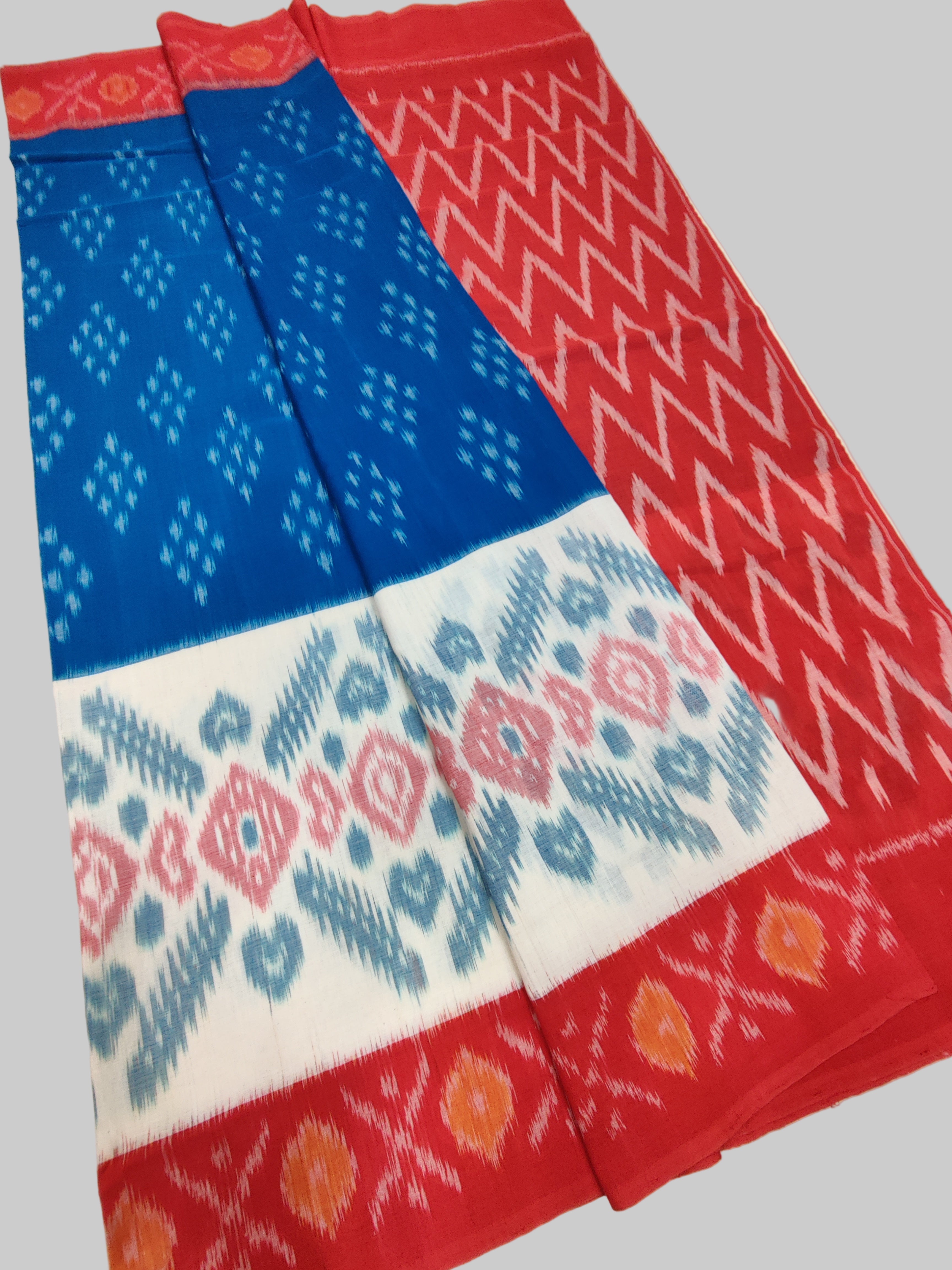 Set of colorful patterned cloths on a white surface